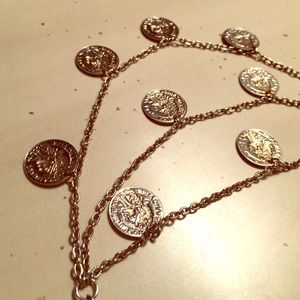 Coin necklace. Three rows with old coins
