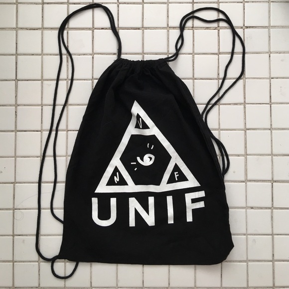 UNIF Handbags - RARE AF.  Unif logo drawstring pull backpack