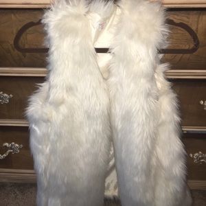 Oversized white faux fur vest