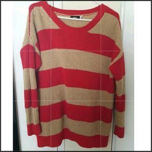 Orange and tan, striped, knitted sweater