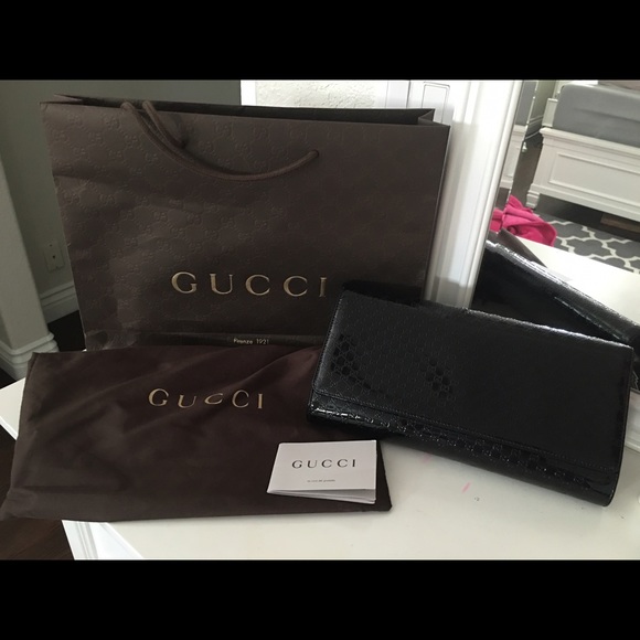 Authentic large Gucci black patent leather clutch