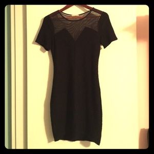 A black, body-con dress.