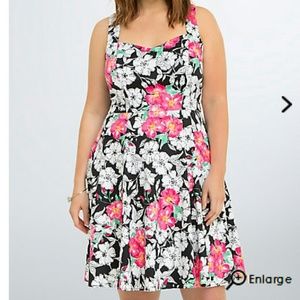 Floral print, open back, swing dress. NWOT.