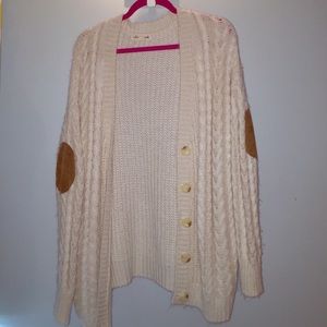 Cream sweater with corduroy elbow patches