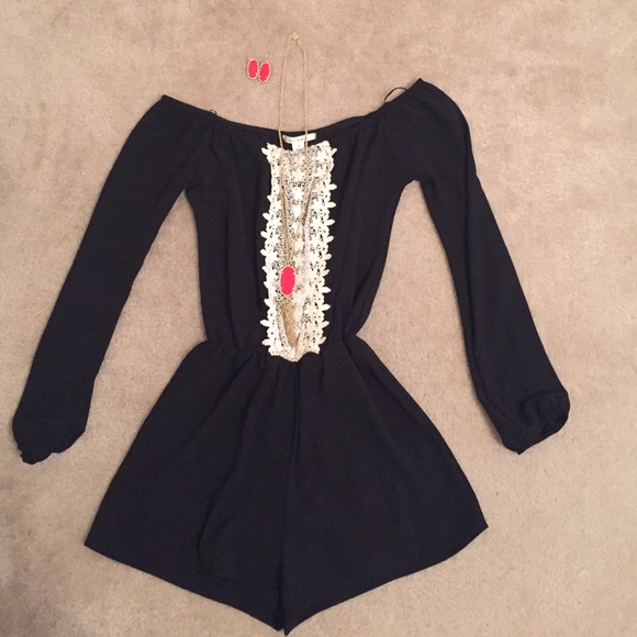 Super cute black long sleeve romper! Worn once!