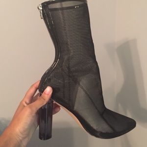 Mesh boot with glass heel