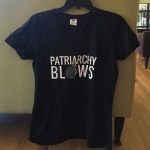 A t-shirt that says "Patriarchy Blows".
