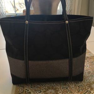 Black Coach bag with metallic trim