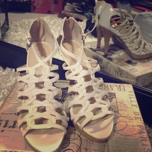 Great condition white strappy heels.