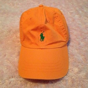 Orange Polo hat with dark green pony