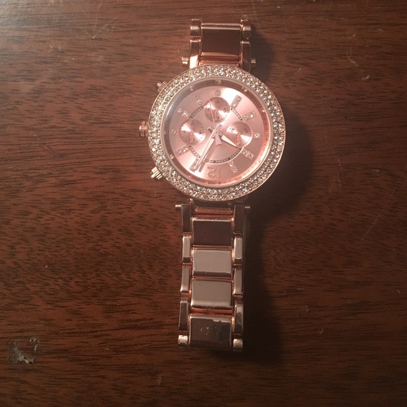 Custom 50k rose gold watch with crystal design.