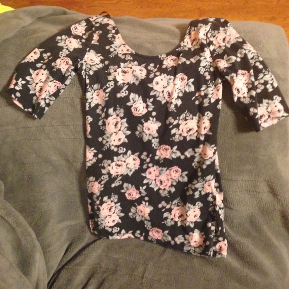 A Clingy Scoop Back Shirt