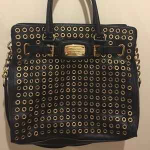 Authentic Michael Kors studded hand bag