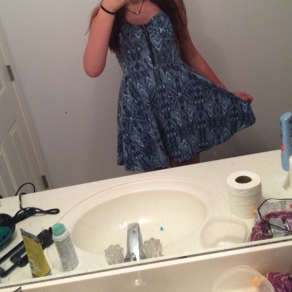 A zipper front blue dress