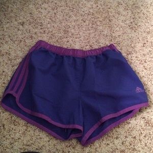 purple running adidas shorts