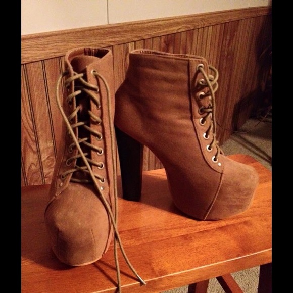 Lace up boots.