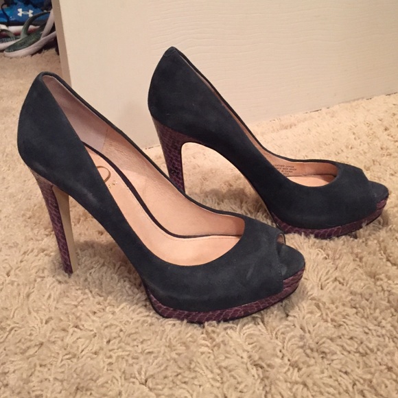 Suede and alligator style open toed pumps.