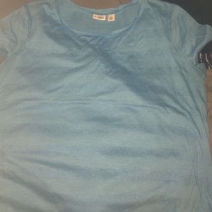 Two shirts that are from Cato's in good condition