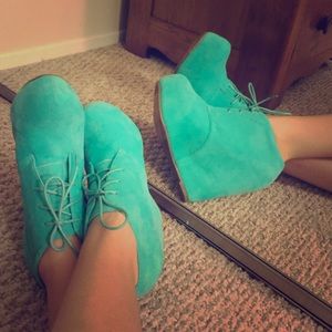 Teal bootie platform wedges.