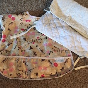 Bumkins shirt-sized bib, with a white changing pad