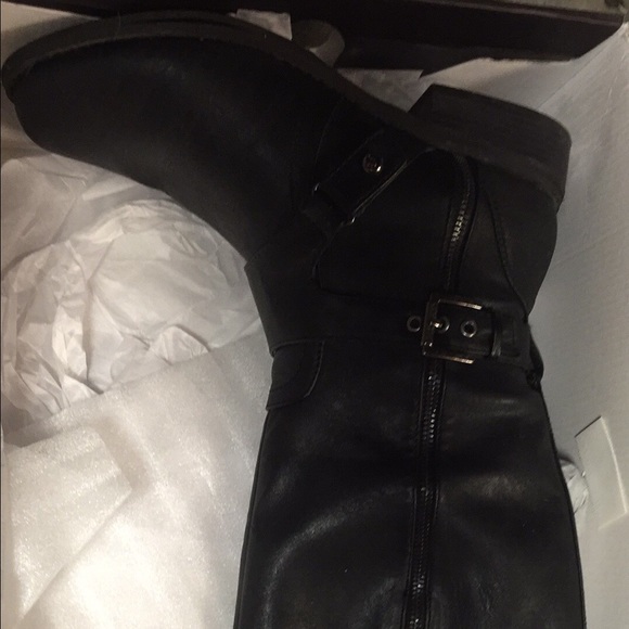 Black riding boots by Guess