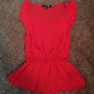 Red top with black polka dots