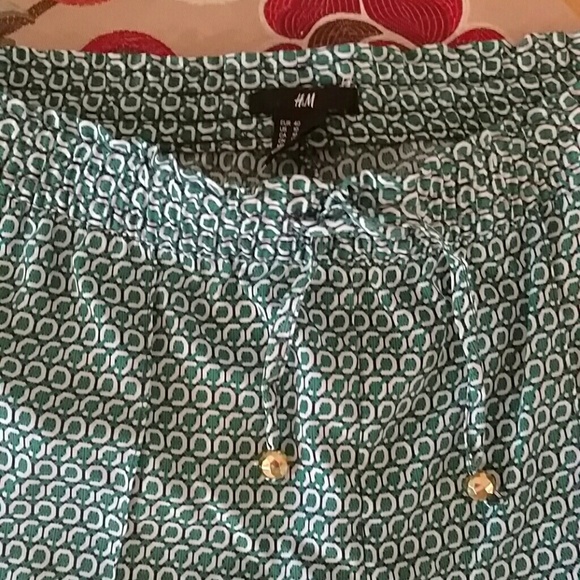 Pull on shorts. Green white and black. - Picture 2 of 3