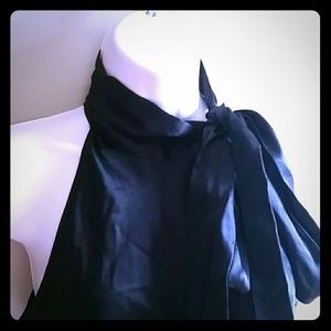 Mock turtle neck sleeveless top.