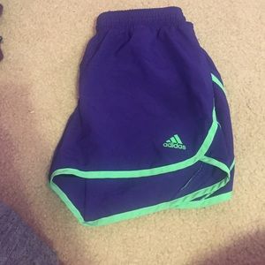 Purple and green adidas shorts