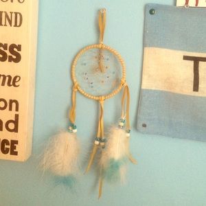 Hand made circle dream catcher with feathers
