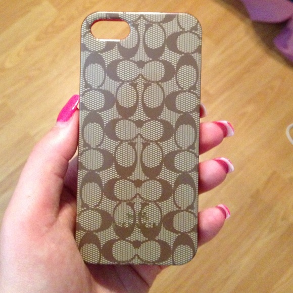 Tan and red coach case :)