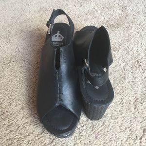 Black leather wedges