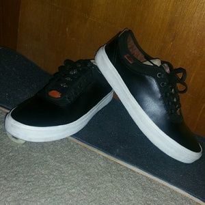 Men's black vans with tribal accent