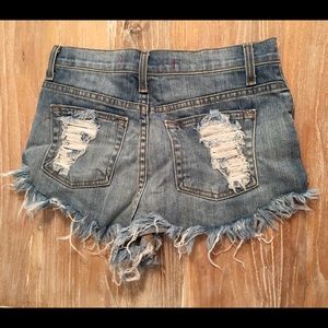 Sneak peak distressed jean shorts