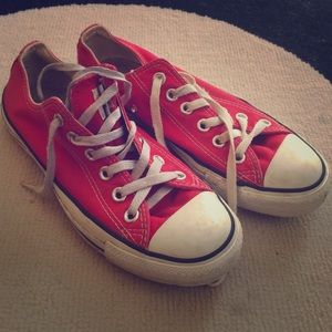 Red low top converse shoes