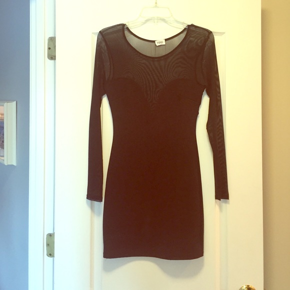 Black dress with sheer neckline, back and arms