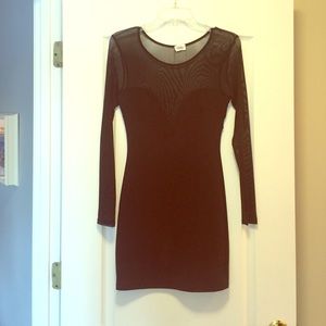 Black dress with sheer neckline, back and arms