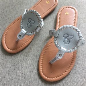 Monogrammed leather sandals