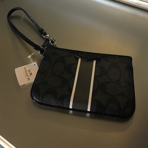 Coach black and silver wristlet