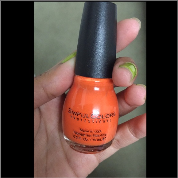 Bright orange nail polish