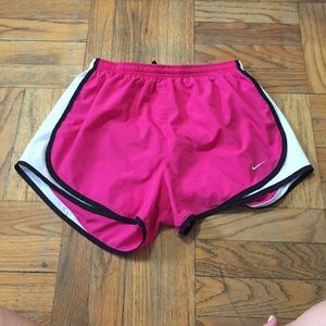 Pink and white Nike shorts