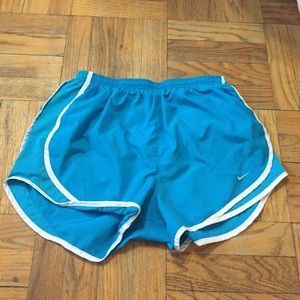 blue and white Nike shorts