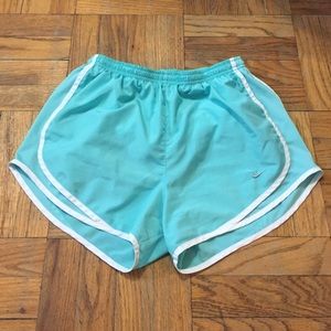 Teal and white nike shorts