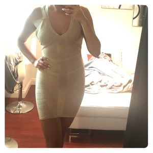 Gold sparkling Bebe bandage dress