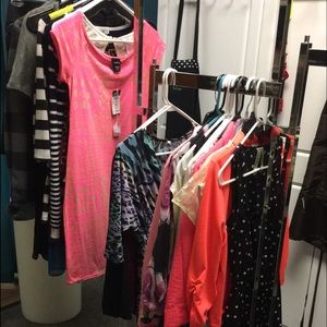 Shirts. Dresses. Shorts. Wallets. Scarfs