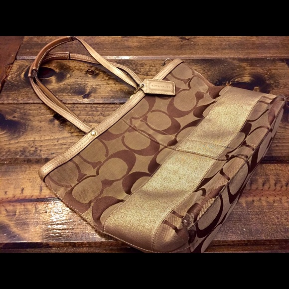 Gold AUTHENTIC COACH purse.