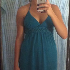 A blue halter dress.