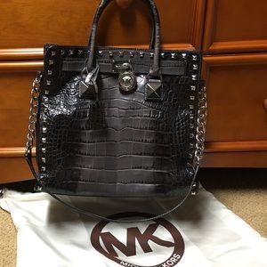 MK grey studded purse