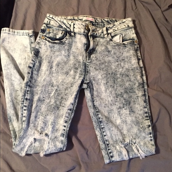 Acid wash distressed jeans