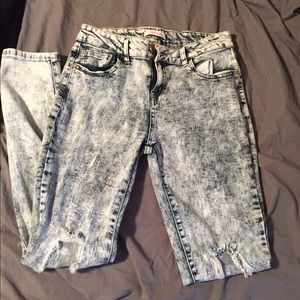 Acid wash distressed jeans